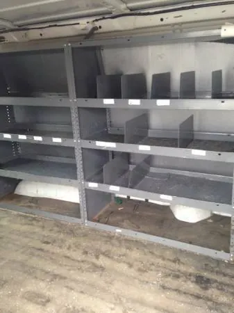 Used parts organized on the shelf at a full-service Indianapolis salvage yard