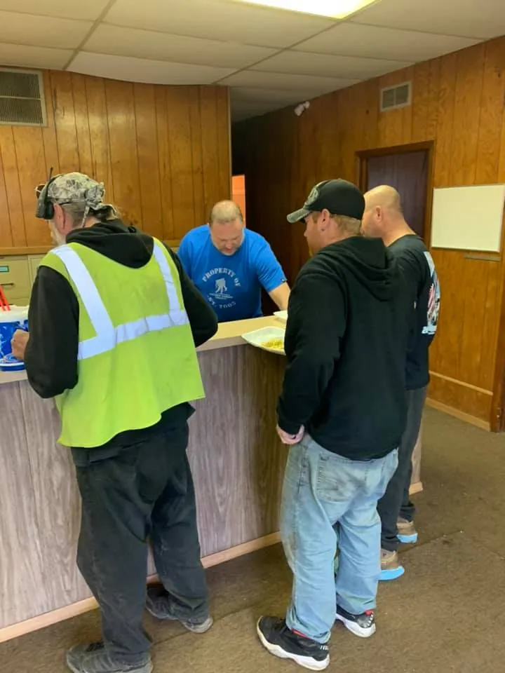 Part-pullers and counter staff at The New Country Auto Parts, the crew that does the wrenching at a full-service yard