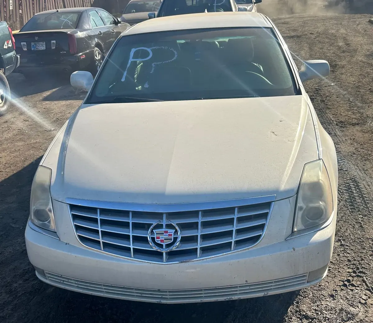 Sedans with Indiana plates at a salvage yard -- what it takes to sell a car without a title in Indiana